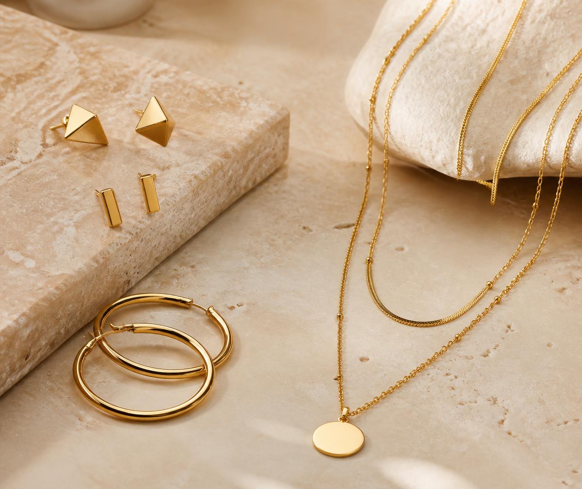 Modern gold-toned geometric studs, hoops and layering necklaces